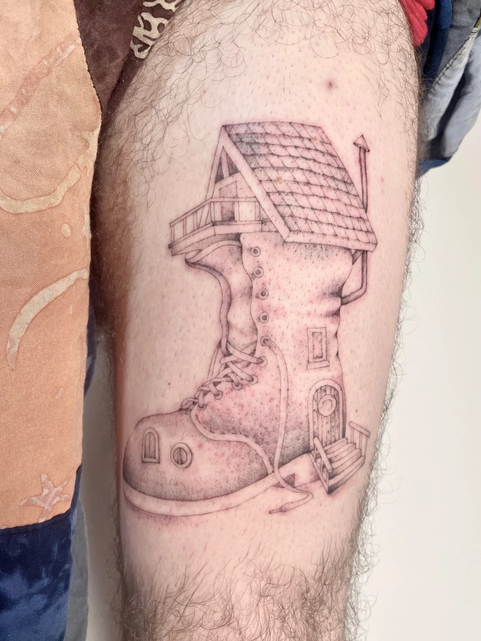 shoe house fine line tattoo on thigh